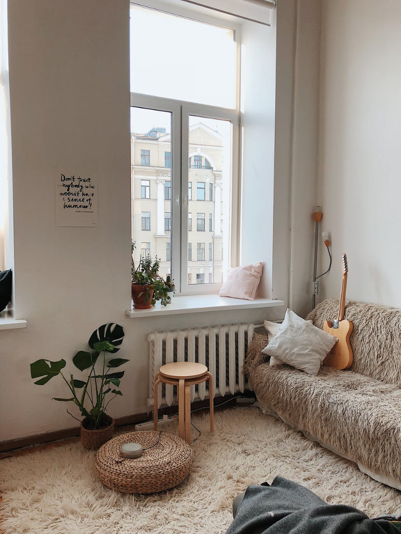 make a living room look bigger living room with shaggy rug and sofa