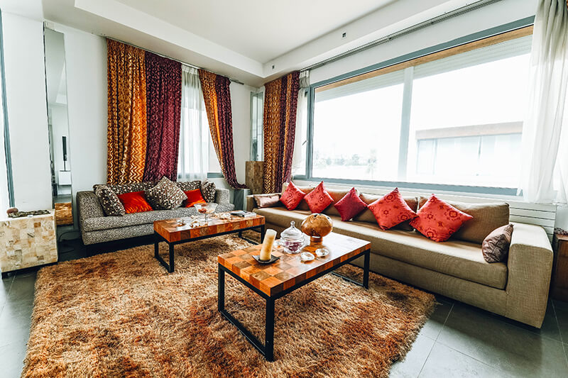 Image by Naim Benjelloun on Pexels living room brown